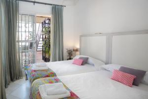 Una cama o camas en una habitación de Lateral Suite Rodo