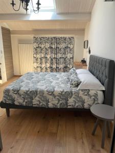 A bed or beds in a room at AFFITTACAMERE LA VOLPE