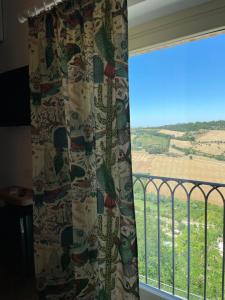 A balcony or terrace at AFFITTACAMERE LA VOLPE
