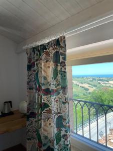 A balcony or terrace at AFFITTACAMERE LA VOLPE
