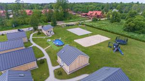 an aerial view of a backyard with a ping pong at Atostogų Medis in Šventoji