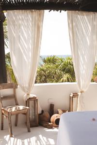 Posezení v ubytování NEST Tulum
