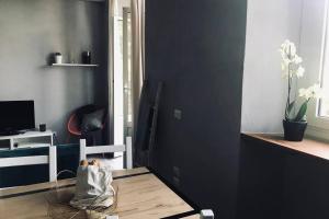 A television and/or entertainment centre at Mazzini apartment