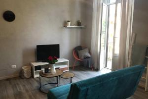 A television and/or entertainment centre at Mazzini apartment