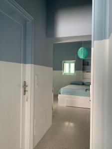 A bed or beds in a room at IANUA Casa per Viaggiatori