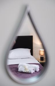A bed or beds in a room at Irinis House