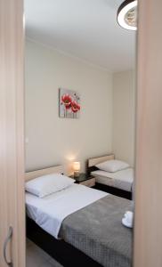 A bed or beds in a room at Irinis House