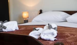 A bed or beds in a room at Irinis House