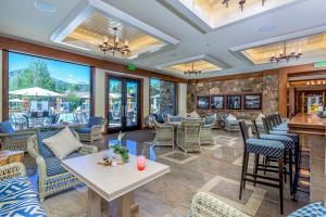 a lobby of a restaurant with chairs and tables at Sun & Ski in Sun Valley