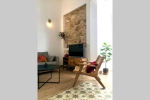 TV a/nebo společenská místnost v ubytování GATU PREMIUM Villa Libertad