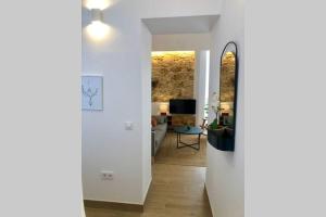 TV a/nebo společenská místnost v ubytování GATU PREMIUM Villa Libertad