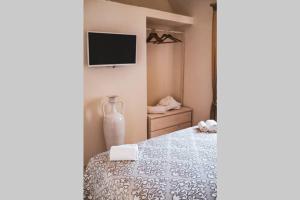 Giường trong phòng chung tại Tenuta Trullo Acquaro Ostuni