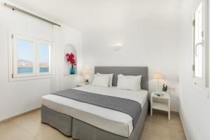 Cama ou camas em um quarto em Corfos Hotel