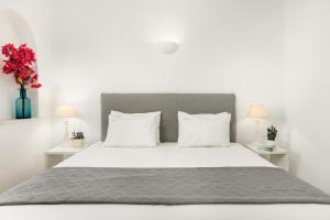 Cama ou camas em um quarto em Corfos Hotel