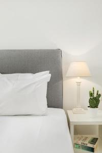 Cama ou camas em um quarto em Corfos Hotel