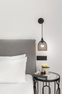 Cama ou camas em um quarto em Corfos Hotel
