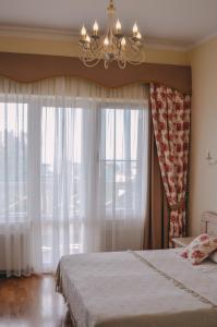 Кровать или кровати в номере Отель Александрия