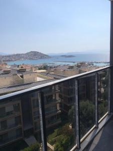 a view of the ocean from a balcony of a building at Riva Marina in Kusadası