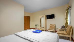 Posteľ alebo postele v izbe v ubytovaní Hotel Cempaka Sari