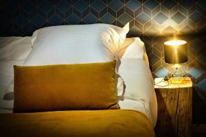 Letto o letti in una camera di Barotel - Bed & Dinner