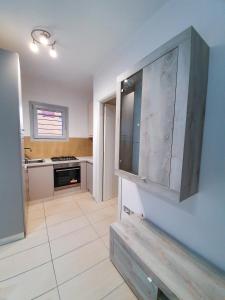 A kitchen or kitchenette at AM apartment