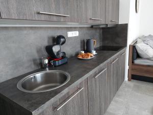 Kuchyň nebo kuchyňský kout v ubytování Apartmán Rezidence Javor Železná Ruda