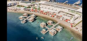 an aerial view of a resort in the water at Apartments Sime in Sukošan