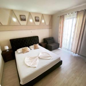 Postel nebo postele na pokoji v ubytování Guesthouse Liamra