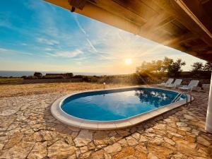 Gallery image of Beautiful secluded area near Novalja vacation house with pool and sea view Villa Lara in Novalja