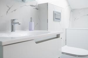Koupelna v ubytování Apartmani Vrtodusic