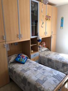 A bed or beds in a room at Casa vacanza bella Puglia