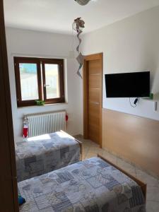 A bed or beds in a room at Casa vacanza bella Puglia