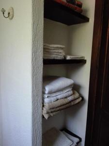 Μία ή περισσότερες κουκέτες σε δωμάτιο στο Villa della Pietra