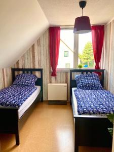 Кровать или кровати в номере Ferienhaus Isaro