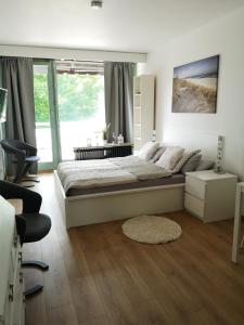 Кровать или кровати в номере Olympiazentrum Kiel-Schilksee