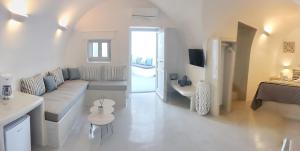 Posezení v ubytování Golden Stone Santorini Suites