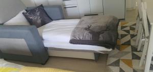 Una cama o camas en una habitación de Apartman Iva