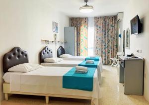 Postel nebo postele na pokoji v ubytování For Rest Aparthotel