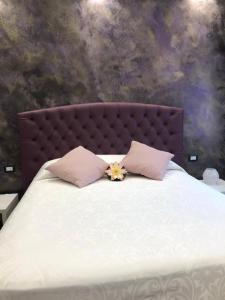 Postel nebo postele na pokoji v ubytování B&B Le Ninfee