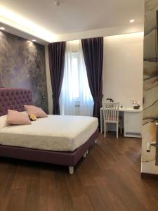 Postel nebo postele na pokoji v ubytování B&B Le Ninfee