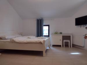 Postel nebo postele na pokoji v ubytování Adrys Boutique Villa