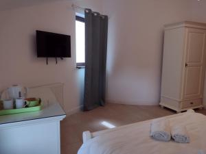 Postel nebo postele na pokoji v ubytování Adrys Boutique Villa