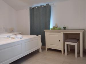 Postel nebo postele na pokoji v ubytování Adrys Boutique Villa
