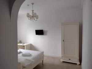 Postel nebo postele na pokoji v ubytování Adrys Boutique Villa