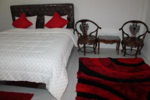 Кровать или кровати в номере Lorent Homestay