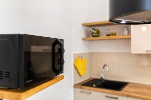 Kuchyň nebo kuchyňský kout v ubytování Apartment Nada 1