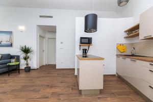 Kuchyň nebo kuchyňský kout v ubytování Apartment Nada 1