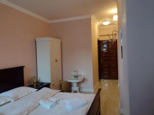 Postel nebo postele na pokoji v ubytování Adrys Boutique Villa