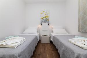 Postel nebo postele na pokoji v ubytování Apartment Nada 1
