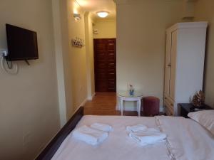 Postel nebo postele na pokoji v ubytování Adrys Boutique Villa